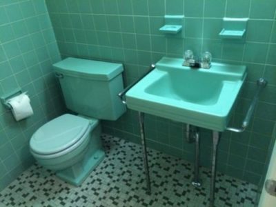 Aqua green toilet with sink